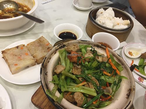 Barbecue veg-meat bun (char siu bao) and turnip cake from the dim sum menu. Hot and sour soup without egg from regular menu. Morning glory from specials menu. All fantastic!  at Three Virtues 三德食品 - North Point in Hong Kong Island