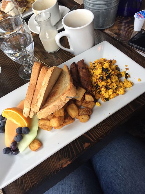 The Classic. VERY small portion of tofu scramble (barely even a 1/3 of the plate). Dry toast since they don’t have vegan butter. at L'Gros Luxe - Duluth in Montreal