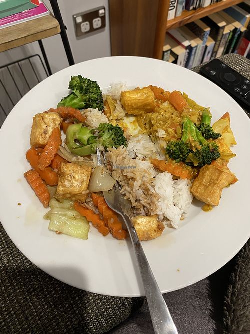 Garlic and black pepper stir fry on left (very bland) and satay on right   at Rolly Thai in Rolleston