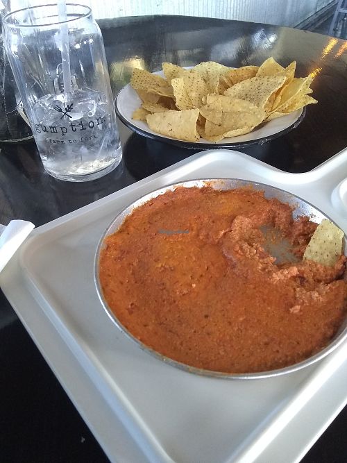 "Not Yo' cheese dip" and tortilla chips (vegan) at gumption in Cedar Rapids