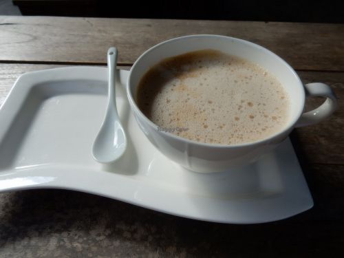 Coffee with coconut milk at Full Moon Wellness Cafe in Chiang Rai