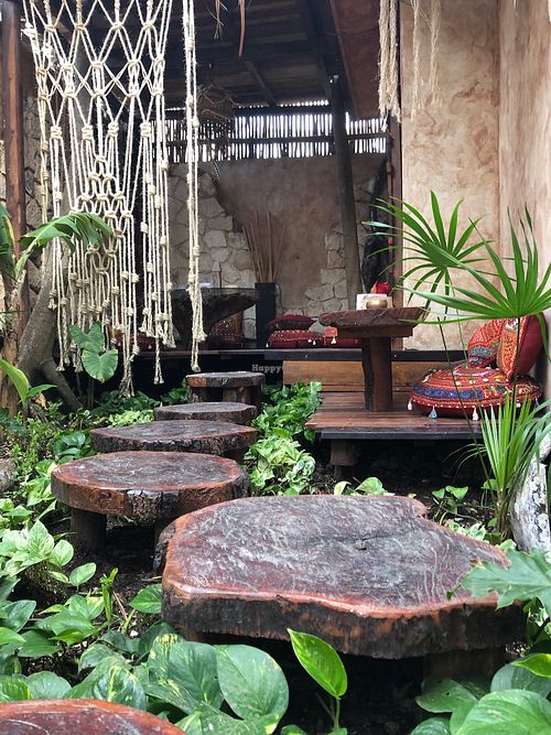 To one of the tables  at Fruto Mistico in Tulum