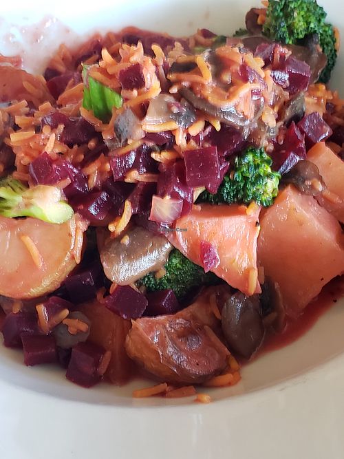 Custom bowl with steamed broccoli, beets, and potatoes. at Hugo's Restaurant - Studio City in Studio City