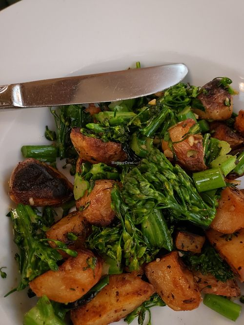 Make a meal. Broccolini and potatoes at Hugo's Restaurant - Studio City in Studio City