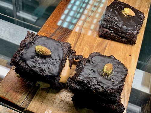 non-vegan chocolate brownies with gold (!?) powder at Klara's Market in Windhoek