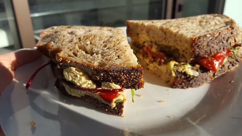 vegan sandwich of the day - it's large (that's a large dinner plate), tasty, nutritious and medium price - you could pay as much for a far inferior pre-packed shop one. at Mark's Bread in Bristol