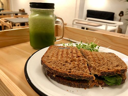 Green juice and cashew cheese toast at Eight - The Health Lounge in Lisbon