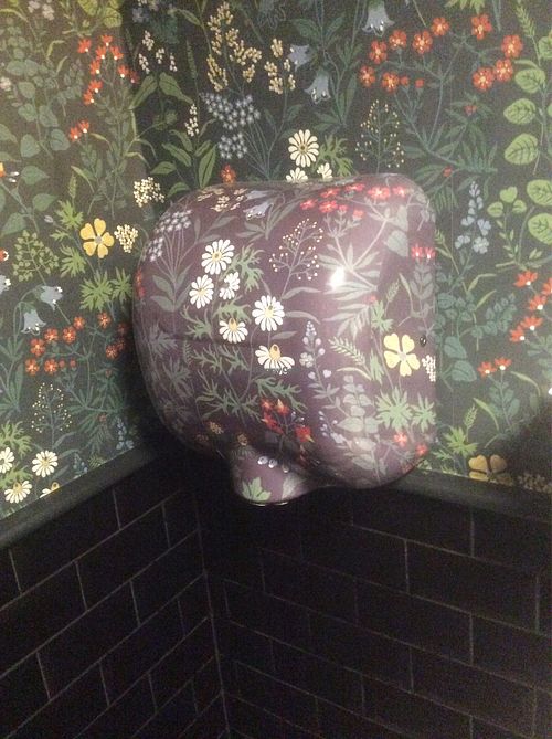The fancy hand drier in Chloe’s toilet at By Chloe - Covent Garden in London