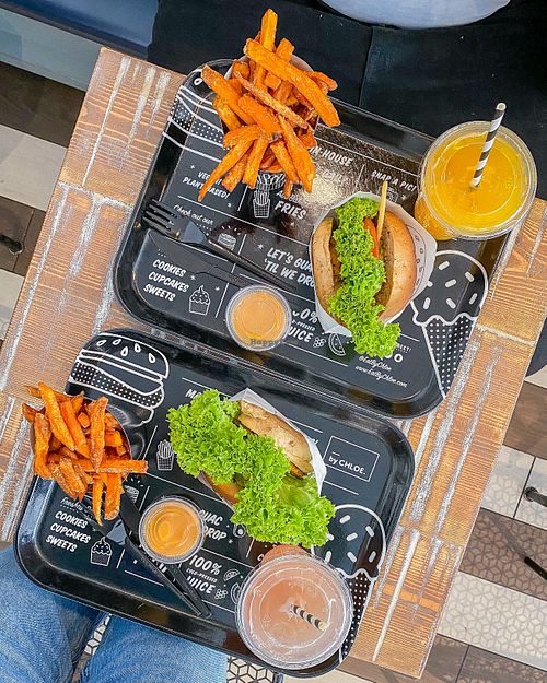 X2 guac burgers with sweet potato fries and homemade lemonade 🤩 at By Chloe - Covent Garden in London