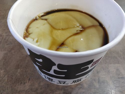 Black beancurd with palm sugar syrup at Woong Kee Traditional Beancurd - People's Park Centre in Central Singapore