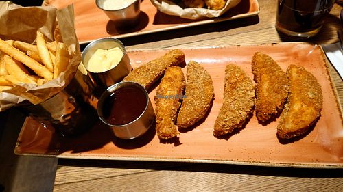 Chicken wings and fries, the sauces are delicious! at Hard Rock Cafe in Innsbruck