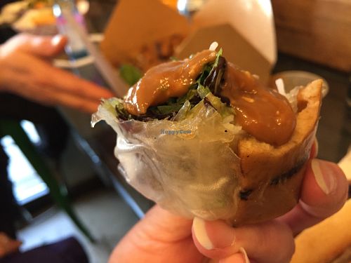 Partially eaten tofu summer roll, with peanut sauce at The Banh Mi Shop in White Plains