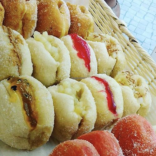 Vegan doughnuts with passion fruit, apple, strawberry and peanut butter at Berlineta in Lisbon