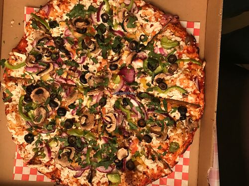 Veggie goddess pizza with vegan cheese  at The Curry Pizza Company - Shaw Ave in Fresno