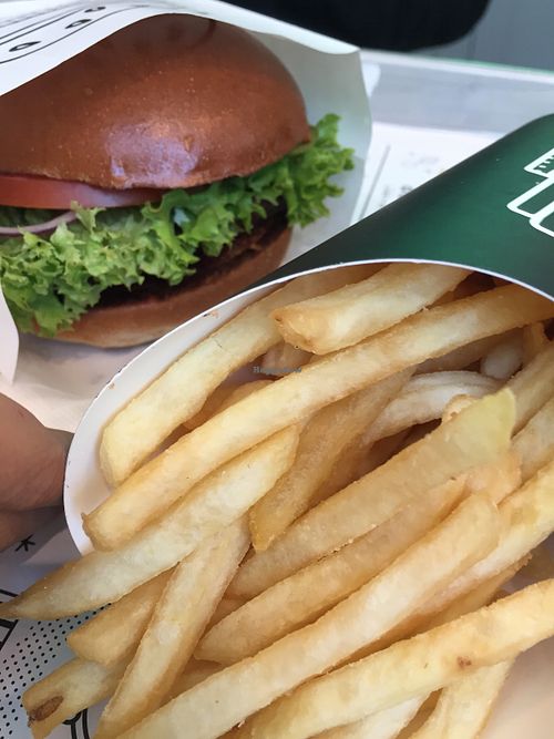 Classic (vegan) burger and fries at By Chloe at By Chloe - Tower Bridge in London