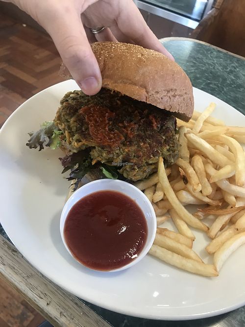 Vegan lentil burger with chips. Tasty but not as good as the tofu burger.  at Badde Manors in Glebe