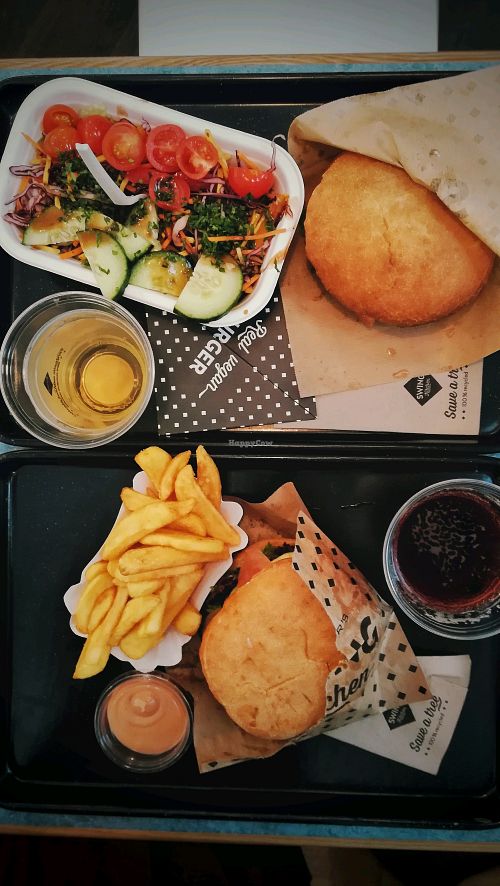Burgers with fries & salad at Swing Kitchen - Währinger Straße in Vienna