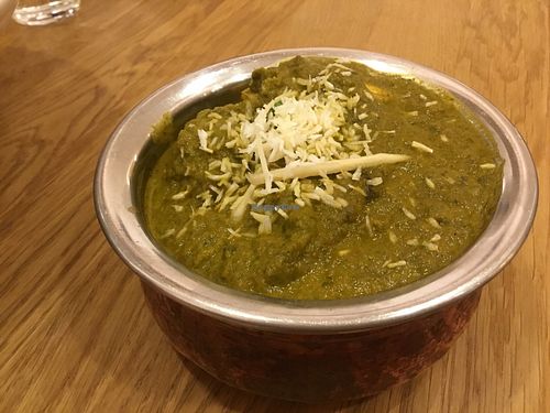 Palak tofu in spinach sauce. at Bhajan Cafe in Krakow