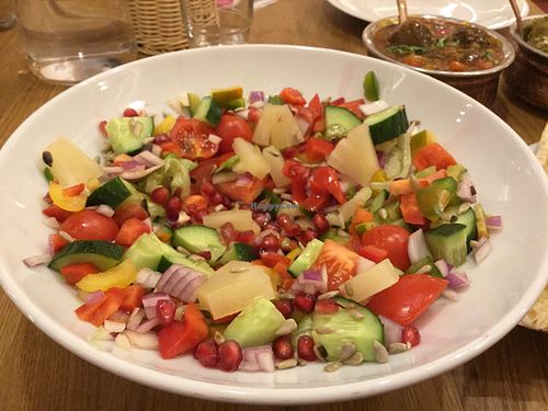 Salad Bouquet with pineapple and pomegranate. at Bhajan Cafe in Krakow