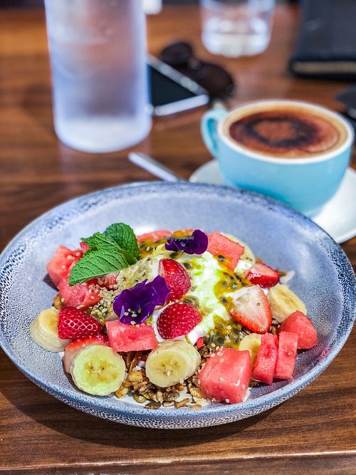 Vegan granola with fruit & caramel coconut yogurt  at Pier B Wholefood Cafe in Hope Island