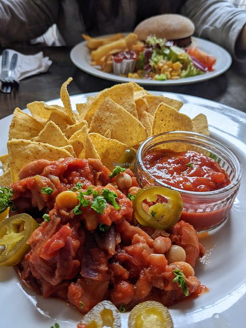 Bean chili with nachos, and burger with chips at The White Hart in Cheddar