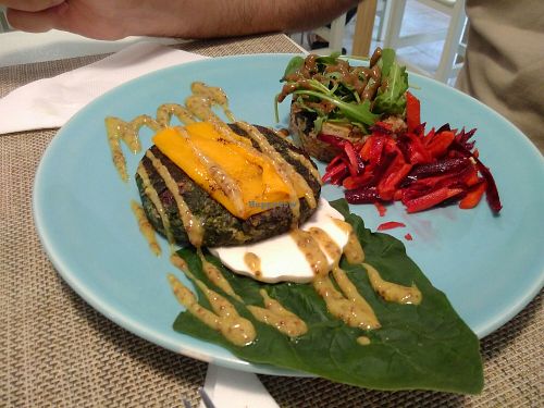 Spinach burger on plate at Verde Mostaza in Vigo
