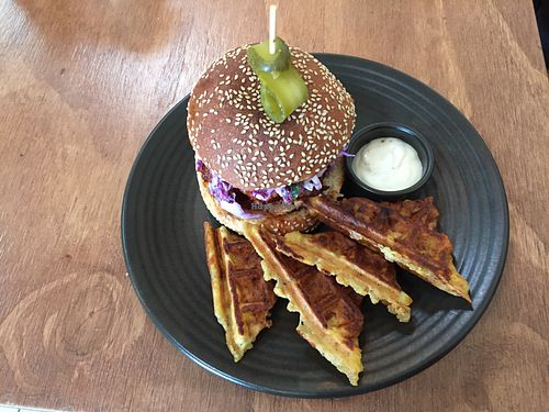 Glazed mock chicken burger with potato waffle fries (special) at One for the Crow in Maidstone