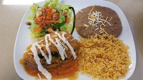 Chile relleno de piccadillo, filled with shredded marinated soy and a vegan cheese. Mmmmm.... at Wild Rooster Bistro in Fair Oaks