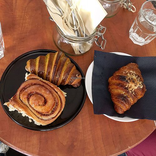 Matcha tea croissant, cheese croissant, cinnamon roll at A&J Bakery in Utrecht