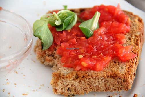 Tomato bread with  very good multi grain bread. This bread was part of non-vegan breakfast set that my companion had.  at Dulces Dreams in Malaga
