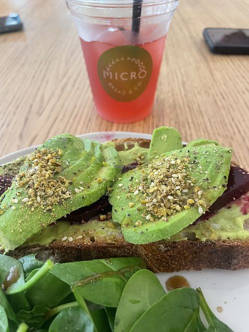 Avocado tartine and pink lemongrass lemonade  at Micro Bakery Kitchen in Central Singapore