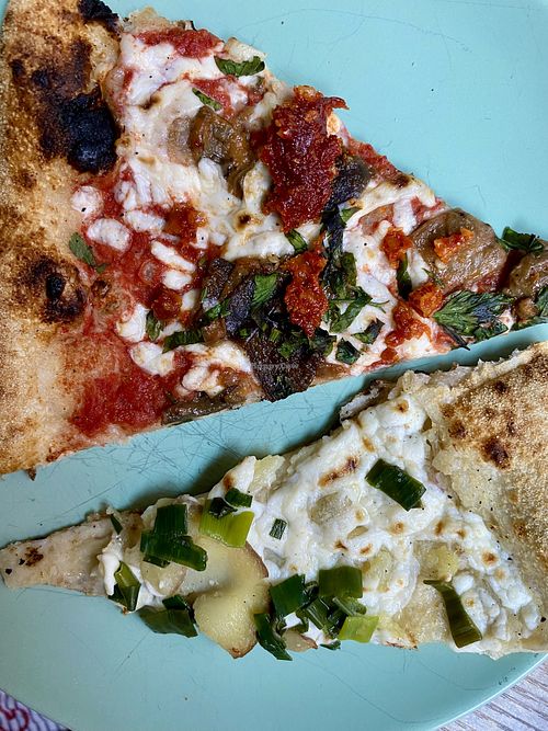 Vegan eggplant, olives and harissa pesto pizza (top). Vegan potato, fennel and scallion pizza (below).  at Pizza Madre in Marrickville