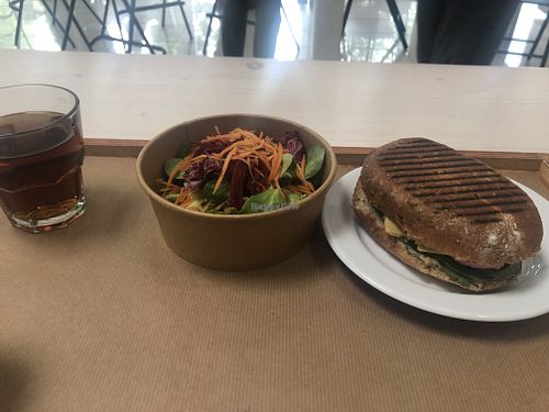 house tea, salad, sandwich with chickpea cheese and greens at Kucha in Ljubljana