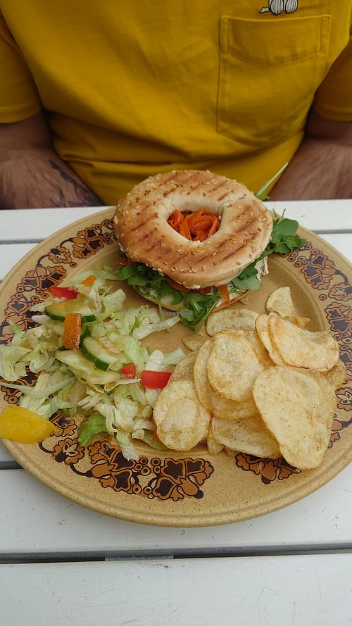 Salmon cream cheese bagel with salad and chips at The Glasvegan in Glasgow