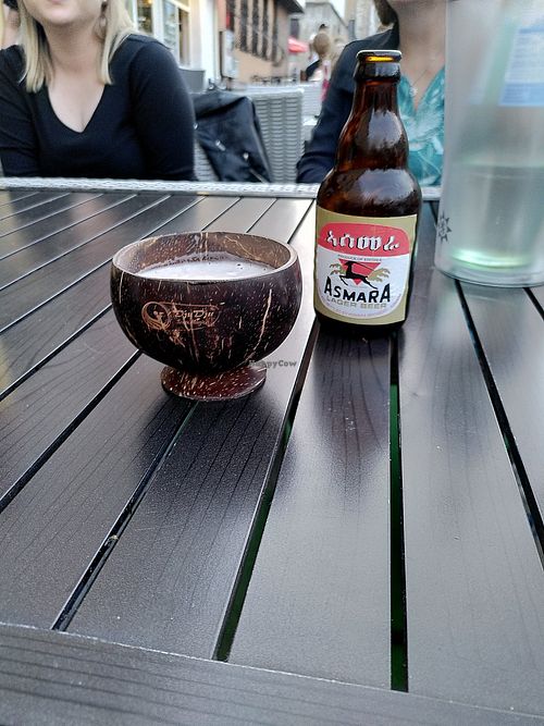 Asmara beer with coconut cup at Mama Afrika in Kassel