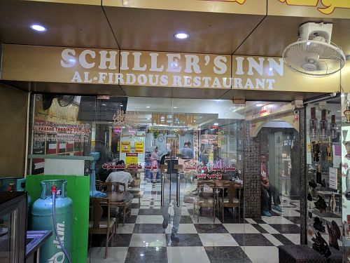 Signage at Al Firdous in Bangkok