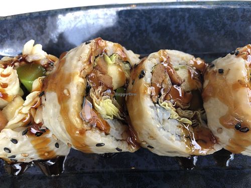 Shojin roll, bbq seitan, grilled asparagus, pineapple, shallot, bibb lettuce, nori, brown rice, soy paper, sweet soy at Blue Sushi Sake Grill in Indianapolis