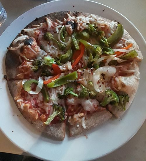 Wood-roasted vegetable pizza on whole wheat with vegan cheese at Brixx Wood Fired Pizza in Virginia Beach