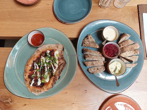 Pizza, bread with dips at Bhalu in Nijmegen