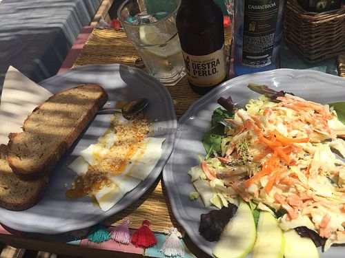 Toast w/goatcheese, nuts, honey (vegetarian) +cabbage-apple-carrot-raisin salad at Grow Café in Tarifa