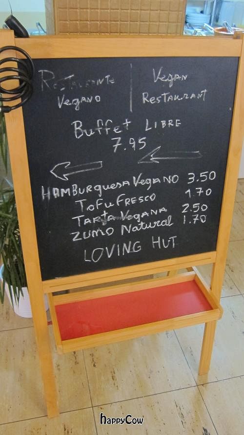 The sandwich board listing daily specials. at Loving Hut in Malaga