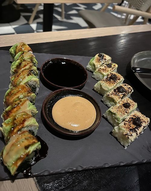 L: Dragon roll; R: Torched & Pressed roll   at PLANTA in Miami Beach