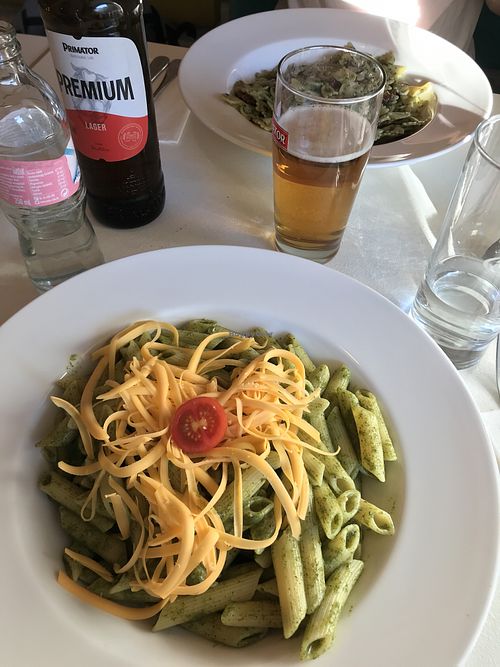 Mine: Creamy garlic spinach pasta, His: Pesto with sundried tomatoes July 2018 at Veganeria in Budapest