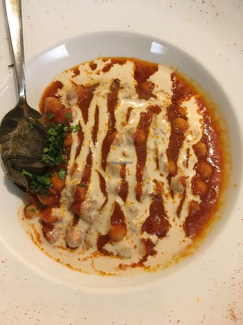 Baked eggplant with chickpea tomato sauce and tahini at Gam-Gam in Venice