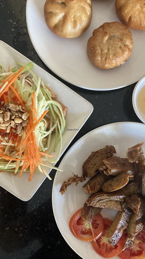 Vegan meat, papaya salad and fried baos with mushrooms  at Monorom Garden in Battambang