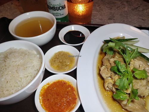 Hainanese Chicken Rice $18 Fragrant rice, housemade chilli, ginger, dark soya sauce
With
Heura plant-based chicken, vegetable broth at Prive - Clarke Quay in Central Singapore