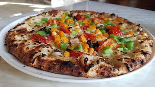 Vegan pizza with garlic sauce, green peppers, sun-dried tomatoes and sweet potatoes at 800 Degrees in Santa Monica