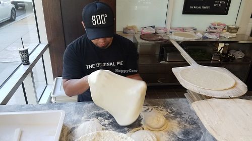 Making a personal pizza at 800 Degrees in Santa Monica