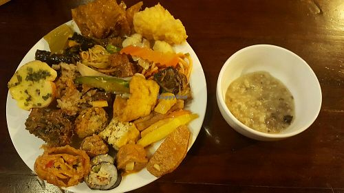 Mushroom porridge and dishes made with soy sheets, tofu, spaghetti and noodles, fried rice were good! at Huong Thien Buffet Chay in Hanoi