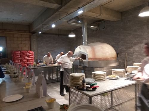 Chefs at work at Romans Pizzeria in Glasgow